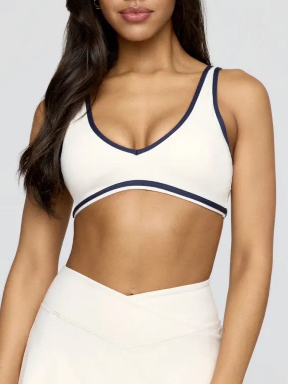 tala contrast trim cream & navy sports bra